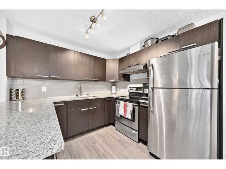Property Photo:  #115 14808 125 St NW  AB T5X 0G1 