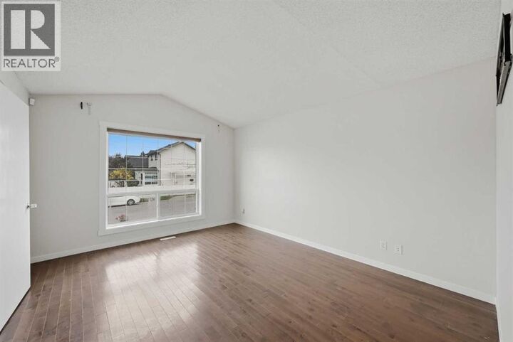 Property Photo:  11 Martinwood Road Northeast  AB T3J 3G6 