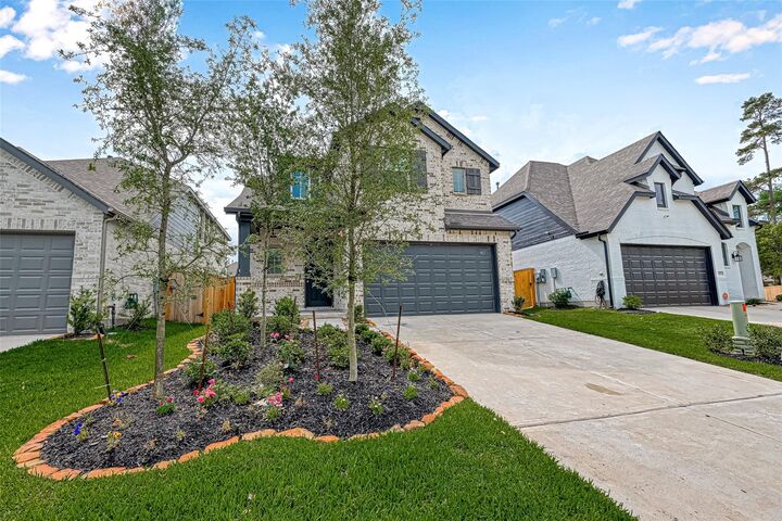 Property Photo:  323 Highland Bayou Drive  TX 77304 