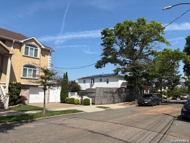 Property Photo:  164-44 89th Street  NY 11414 