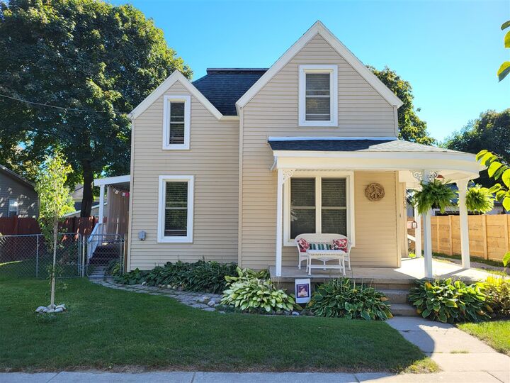 Property Photo:  108 W Upright Street  MI 49720-1323 