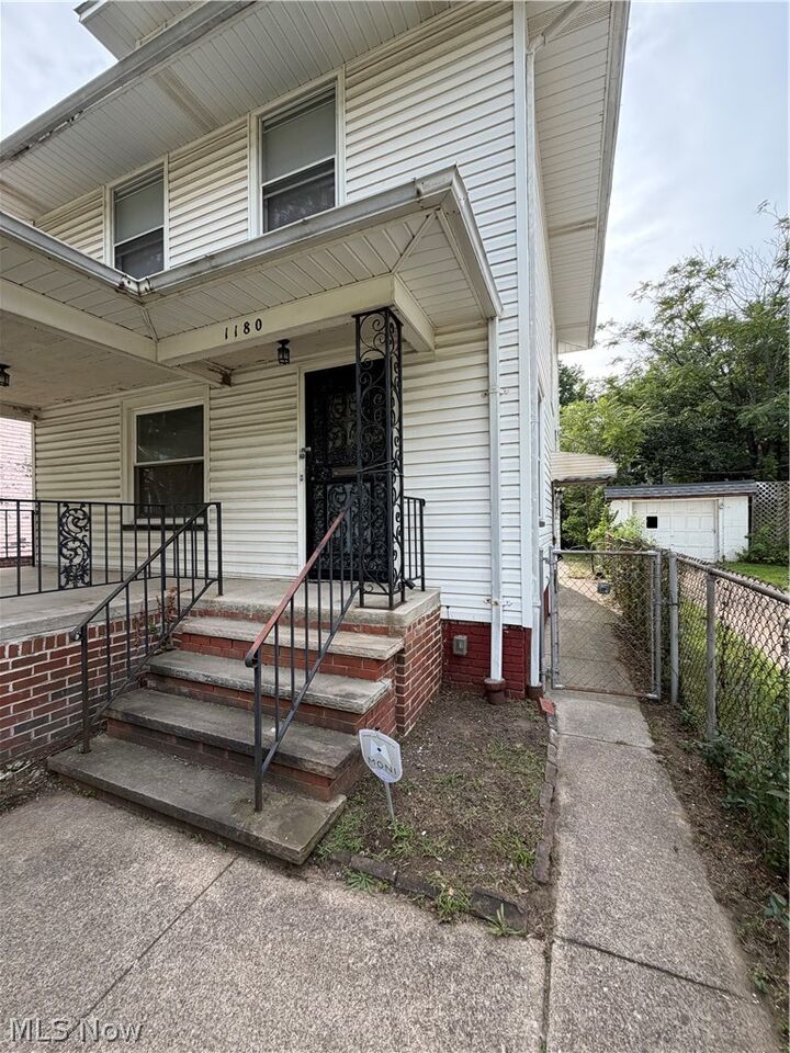Property Photo:  1180 E 146th Street  OH 44110 