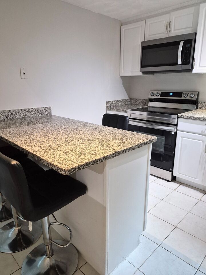 Property Photo:  4 Royal Dane Drive 16  MA 02050 
