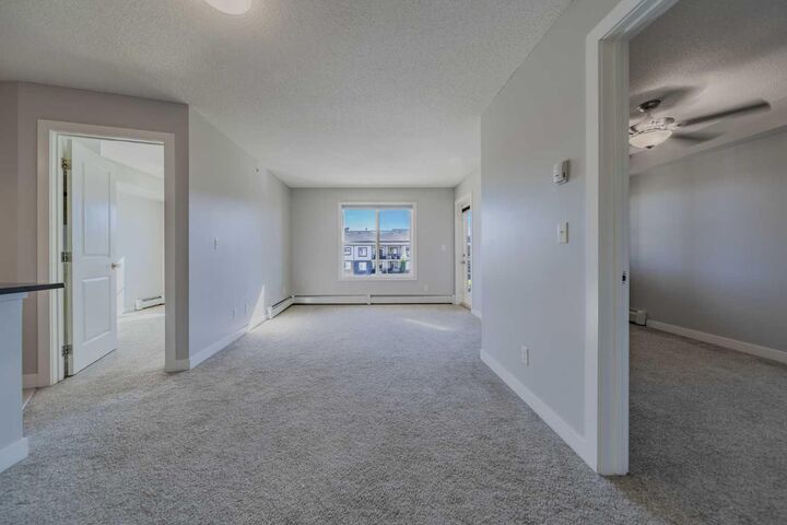 Property Photo:  81 Legacy Boulevard SE 1405  AB T2X 2B9 