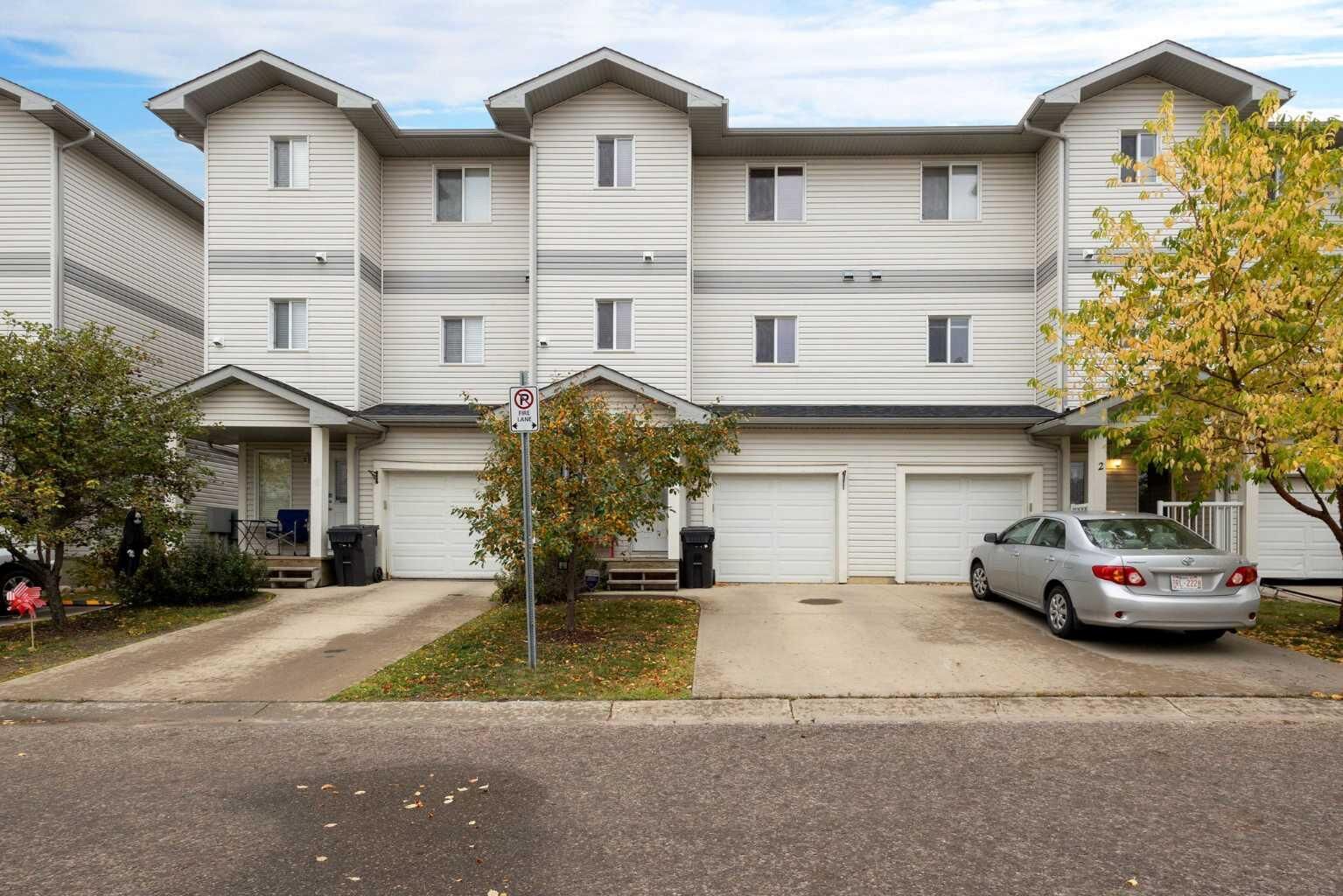Property Photo:  313 Millennium Drive 3  AB T9K 0M2 