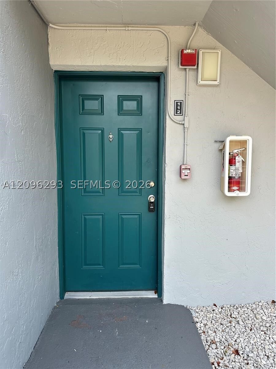 Property Photo:  7020 NW 179th St 112  FL 33015 