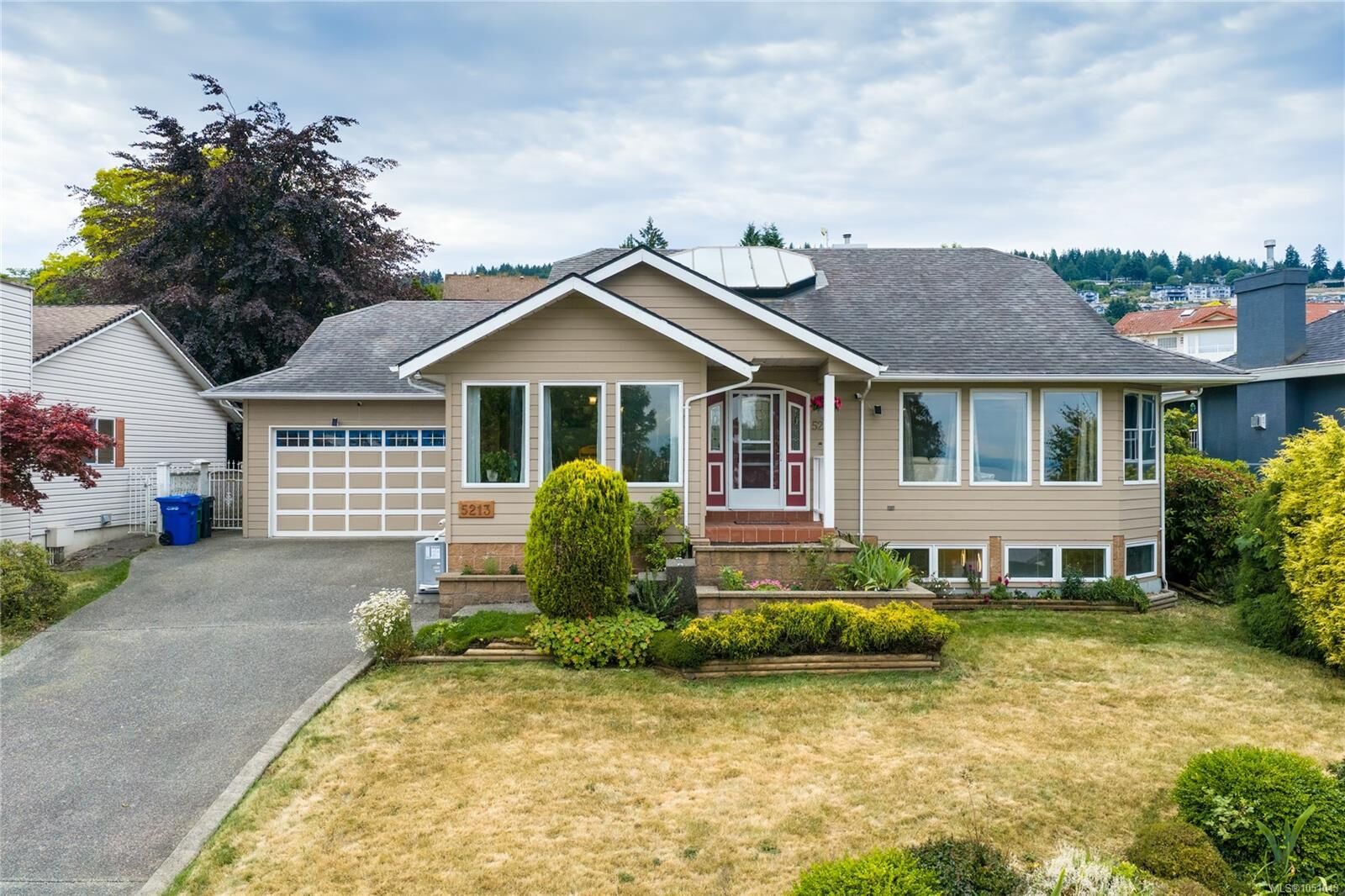 Property Photo:  5213 Fillinger Cres  BC V9V 1H7 