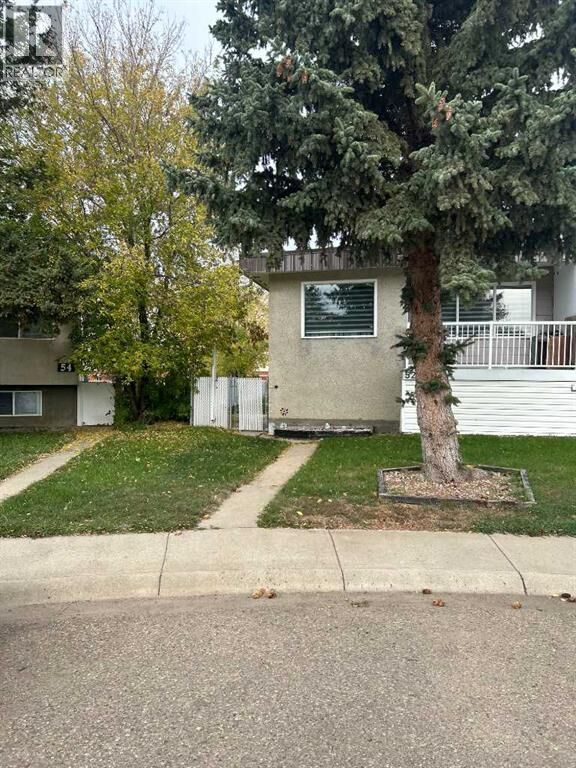 Property Photo:  52 Westbrook Crescent West  AB T1R 0A9 