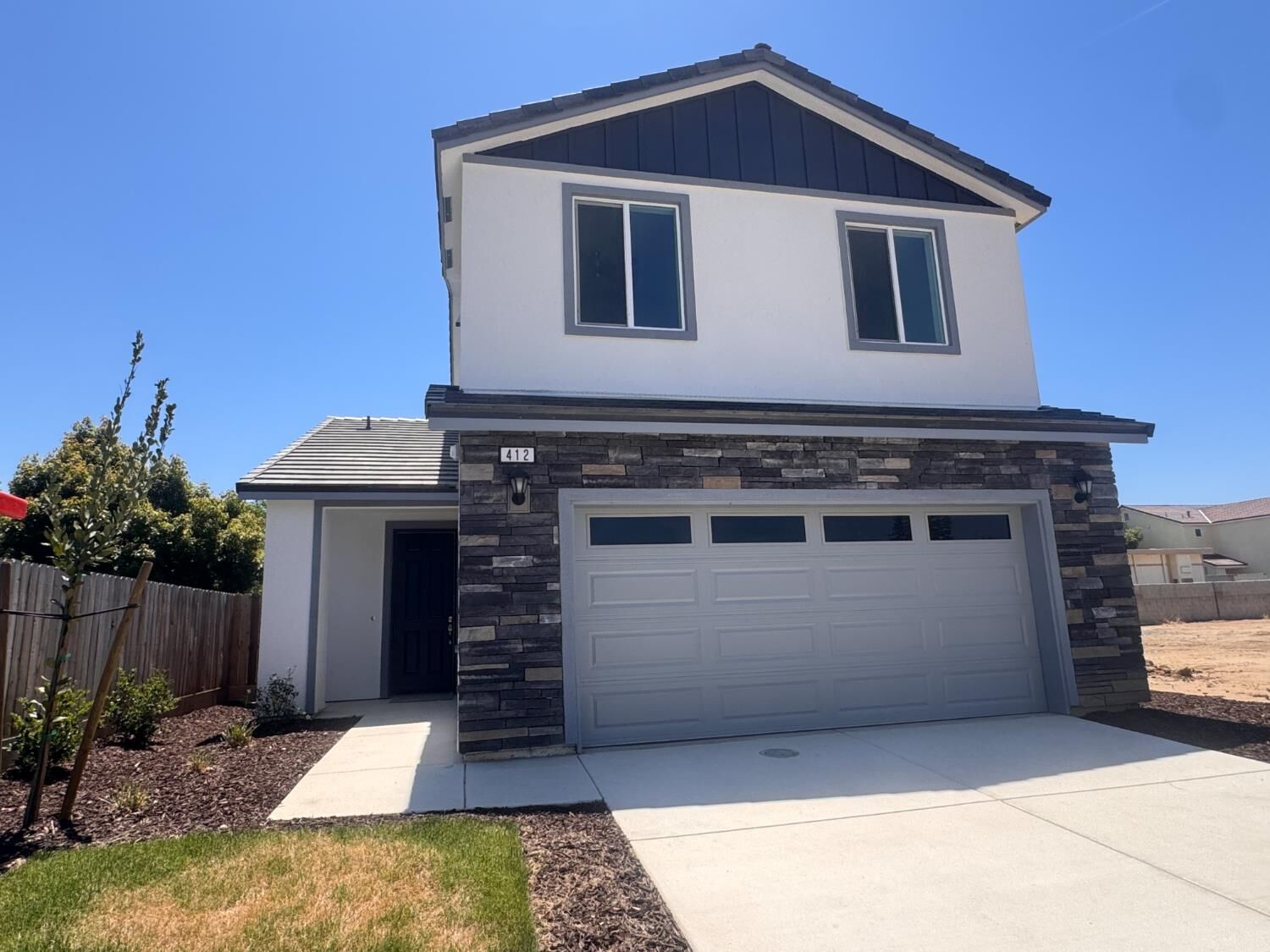 Property Photo:  412 W Escalon Avenue  CA 93612 
