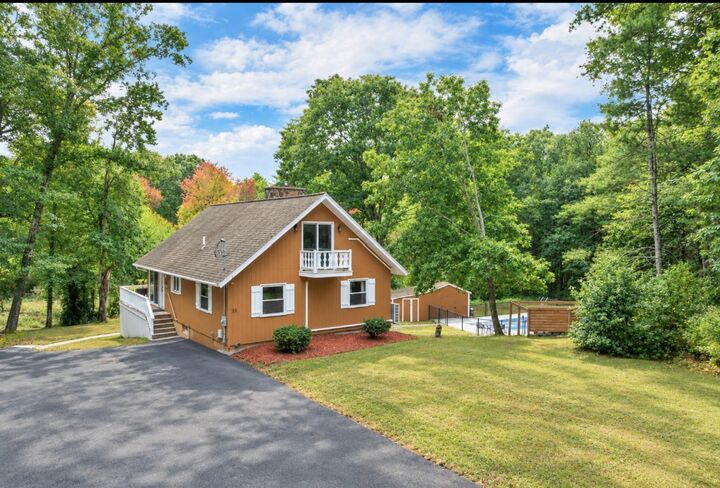 Property Photo: 53 Westside Drive NH 03811