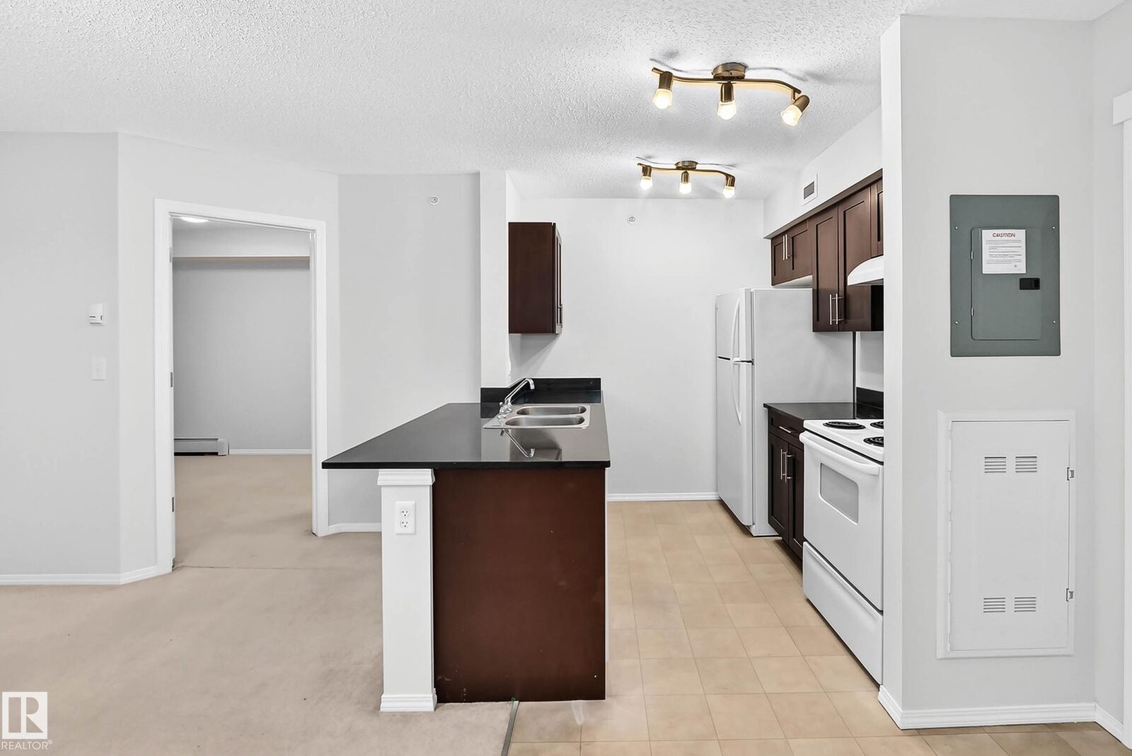 Property Photo:  12025 22 Avenue SW 404  AB T6W 2Y1 