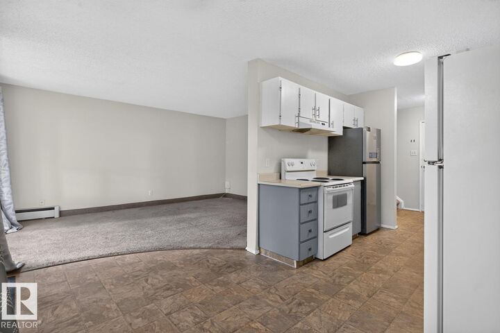 Property Photo:  237 Woodvale Road NW  AB T6L 1G7 