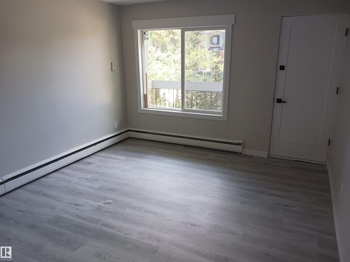 Property Photo:  10045 154 Street NW 2  AB T5P 2H1 