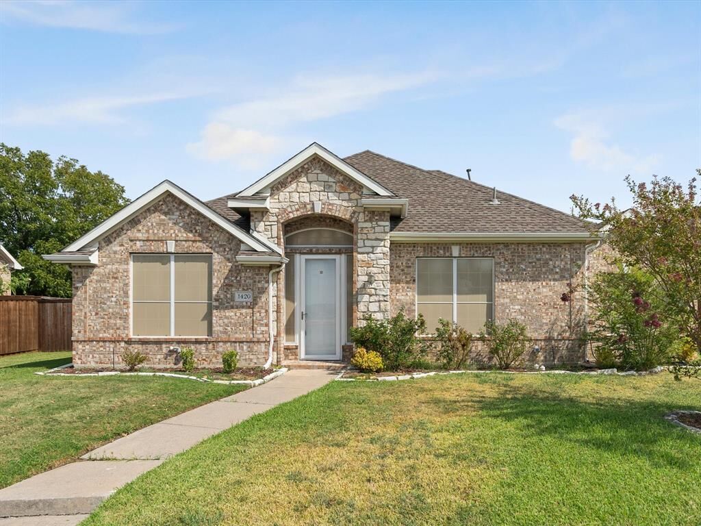 Property Photo: 1420 Hudspeth Drive TX 75010