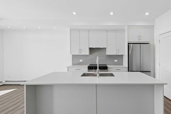 Property Photo:  1802 Mahogany Boulevard SE 6411  AB T3M 4A5 