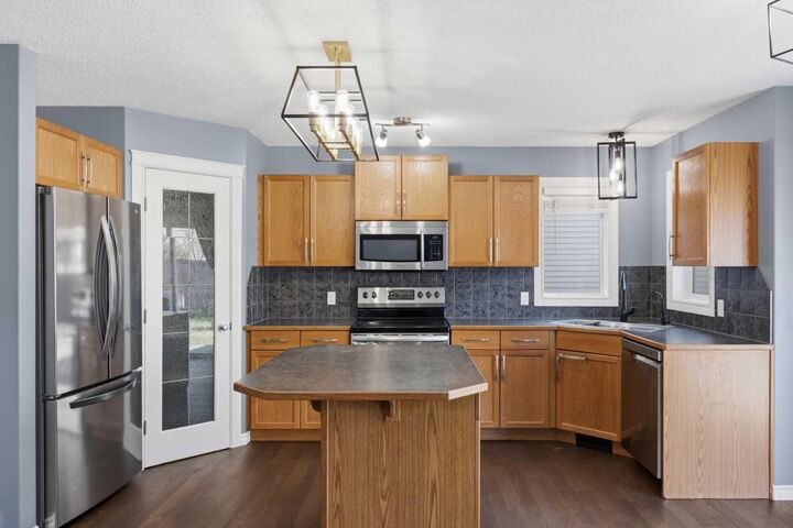 Property Photo:  344 Sagewood Place SW  AB T4B 3M8 