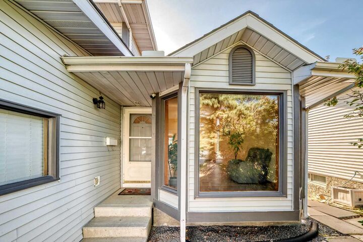 Property Photo:  144 Hawkdale Close NW  AB T3G 2Z9 