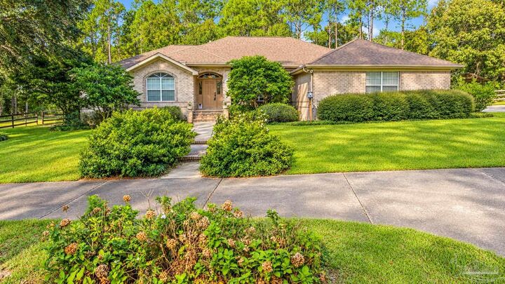Property Photo:  2400 Renfroe Rd  FL 32571 