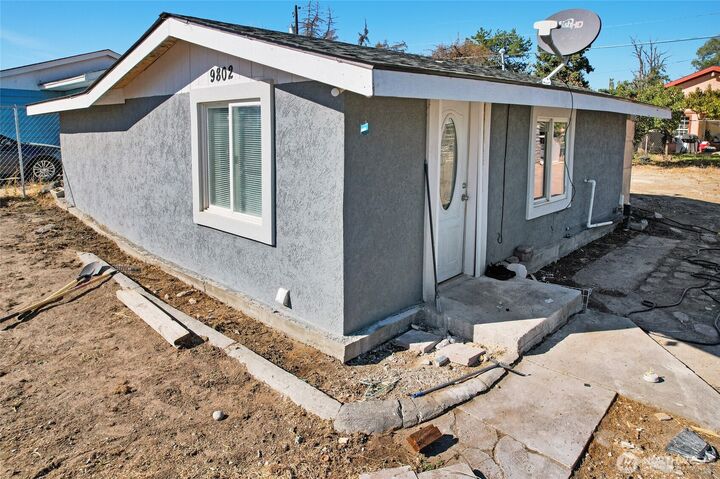Property Photo:  9802  Highland Drive NE  WA 98837 