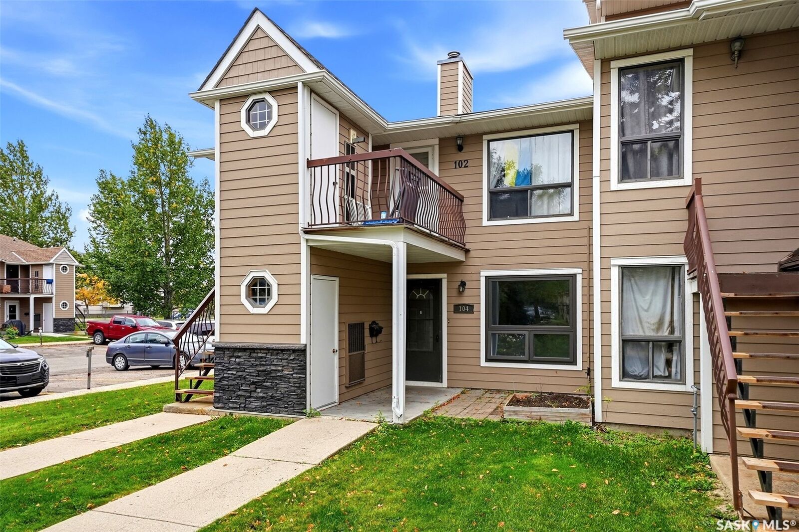 Property Photo:  104 Cedar Meadow Drive  SK S4X 3J6 