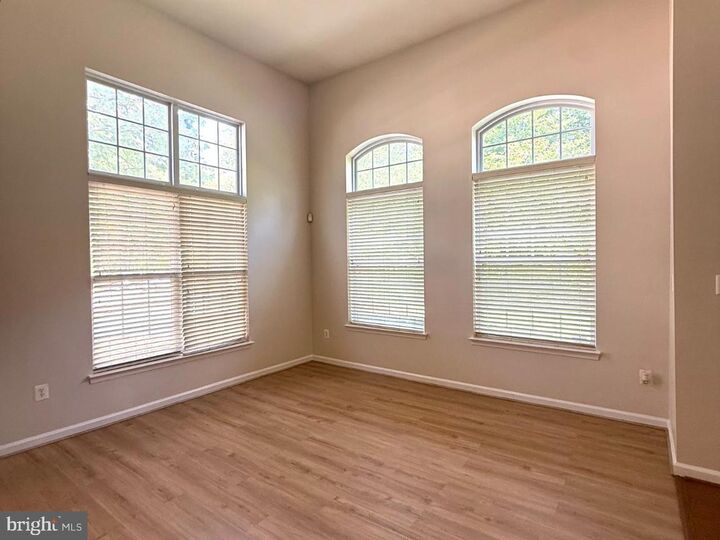 Property Photo:  12400 Rollys Avenue 1501  MD 20774 