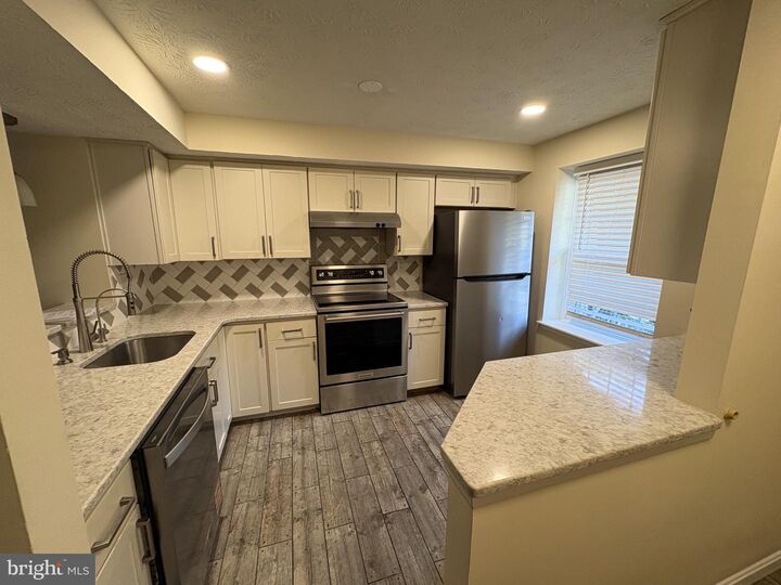 Property Photo:  13809 Palmer House Way 33-244  MD 20904 