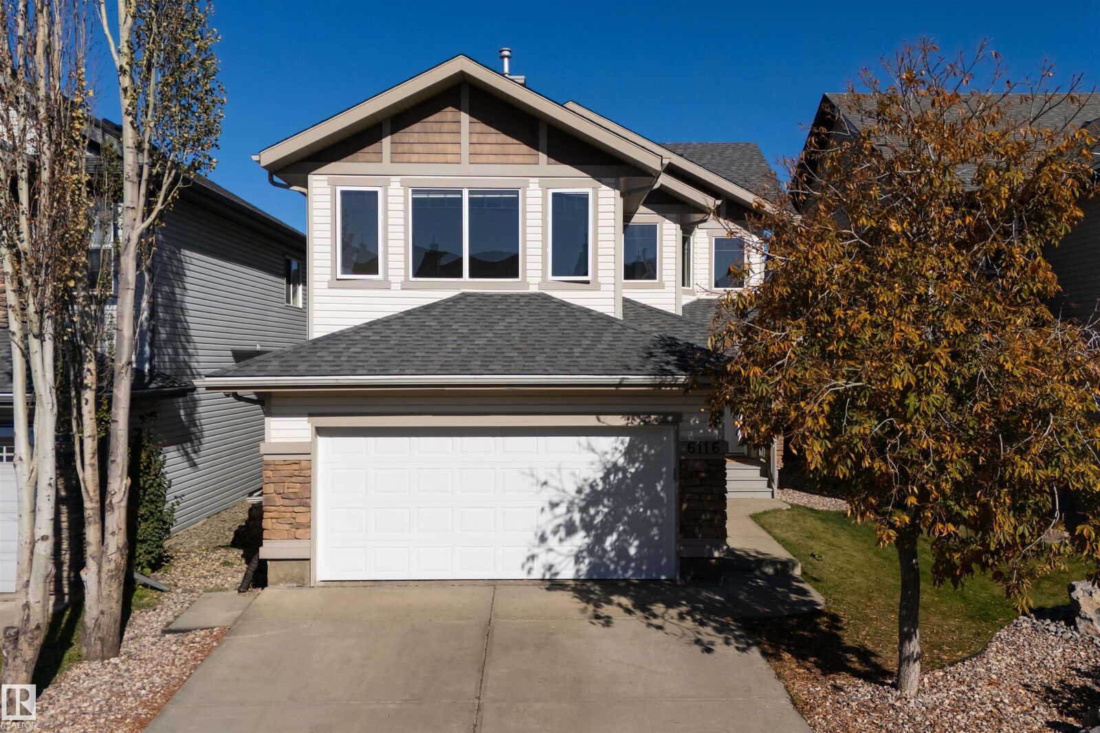 Property Photo:  6116 8 Avenue SW  AB T6X 0G3 