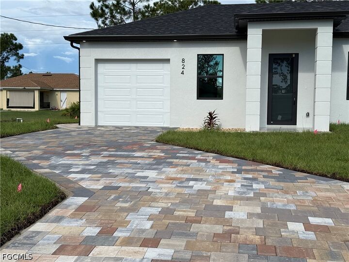Property Photo:  824 Dawhert Avenue S  FL 33974 
