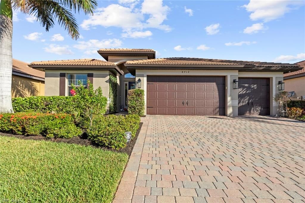 Property Photo: 8712 Westwood Oaks Pl FL 33908