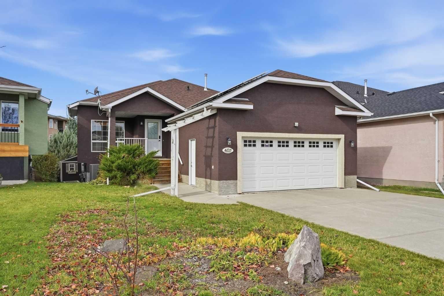 Property Photo:  407 Lineham Acres Bay NW  AB T1V 1T3 