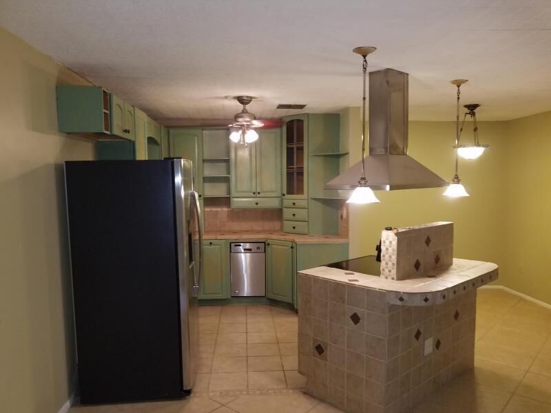 Property Photo:  5725 Fernley Drive E 7  FL 33415 