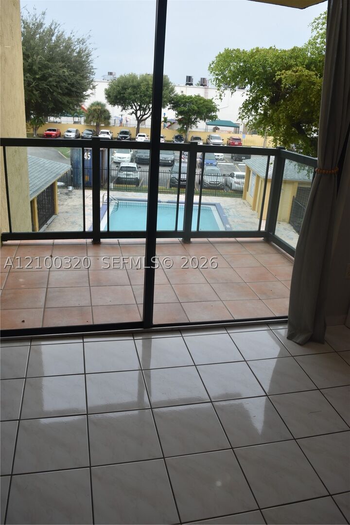 Property Photo:  11800 SW 18th St 306-4  FL 33175 