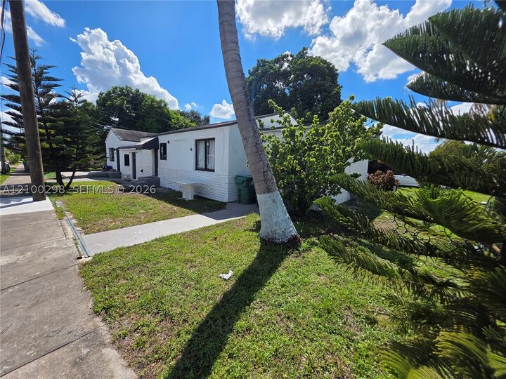 Property Photo: 1102 NW 103rd St FL 33150