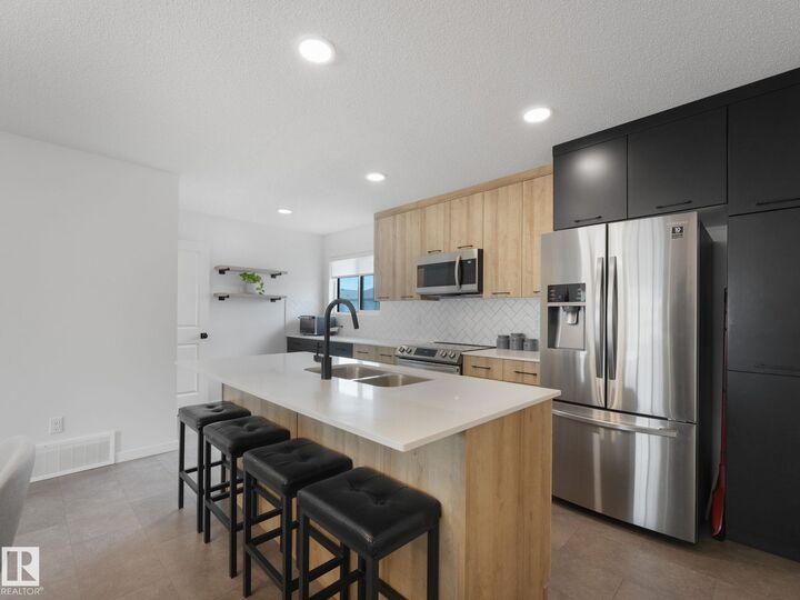 Property Photo: 1061 Cy Becker Road NW AB T5Y 4B7