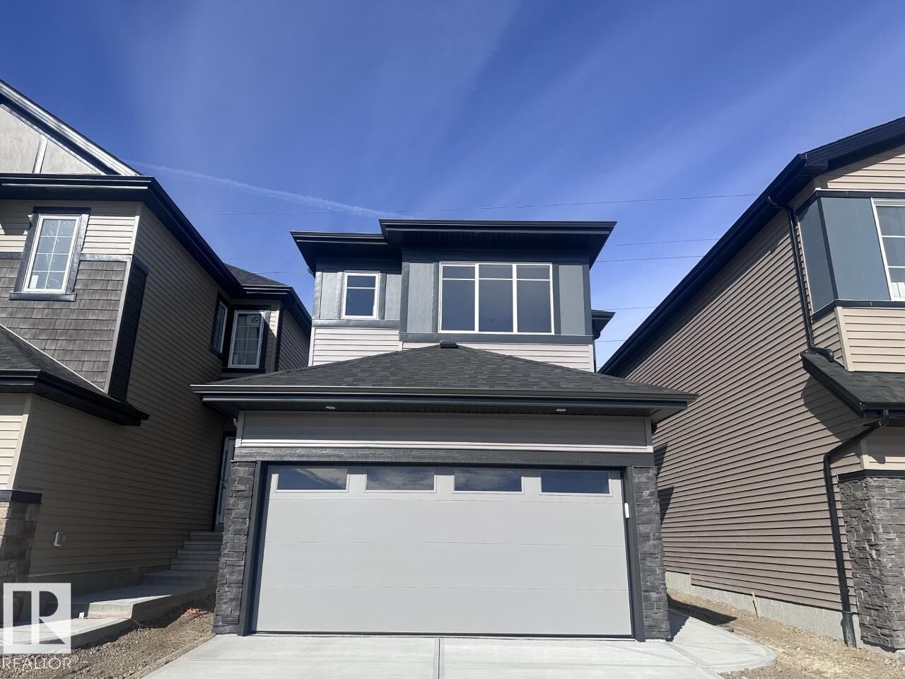 Property Photo:  17228 5 Street NW  AB T5Y 6G4 