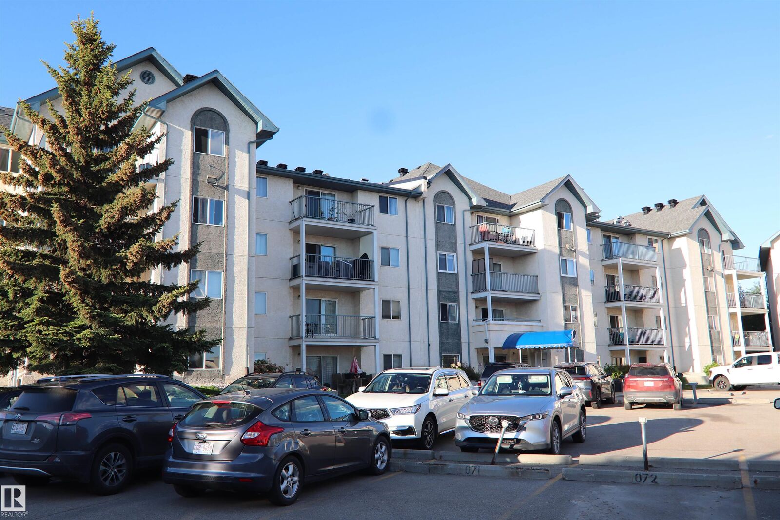 Property Photo:  6720 158 Avenue NW 421  AB T5Z 3B1 