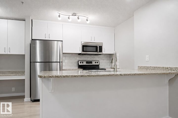 Property Photo:  5515 7 Avenue SW 127  AB T6X 2A8 