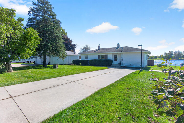 Property Photo:  555 Norvell Beach Drive  MI 49230 