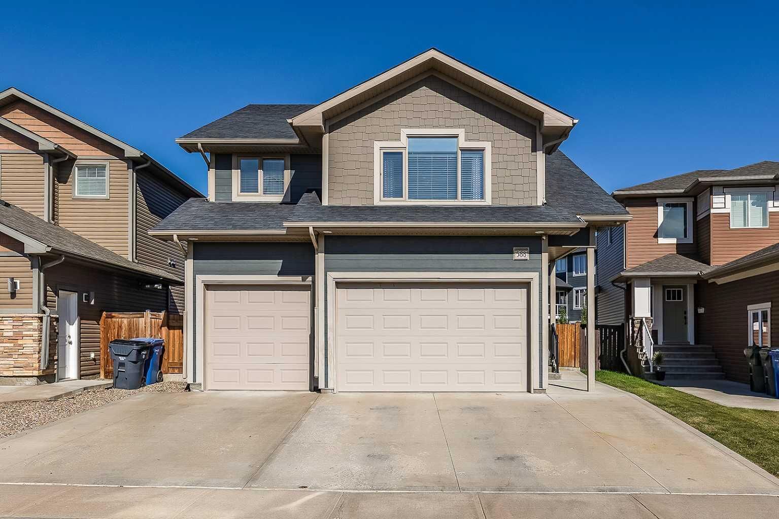 Property Photo:  588 Vista Drive SE  AB T1B 0N1 