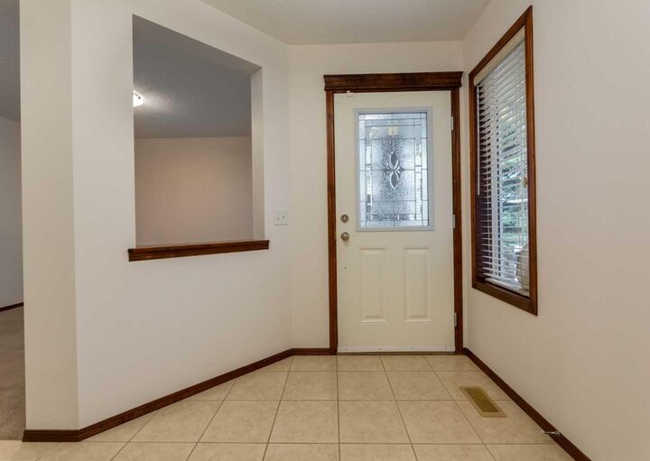 Property Photo:  424 Hidden Creek Boulevard NW  AB T3K 6J1 