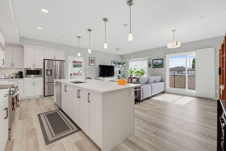 Property Photo:  300 Harvest Hills Place NE 204  AB T3K 2P4 