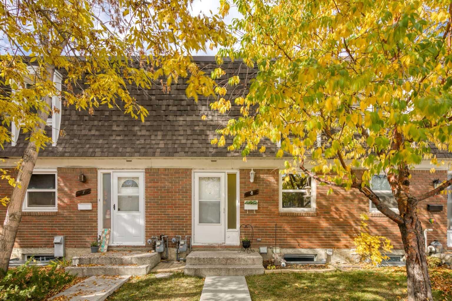 Property Photo:  330 Canterbury Drive SW 8  AB T2W 1H6 