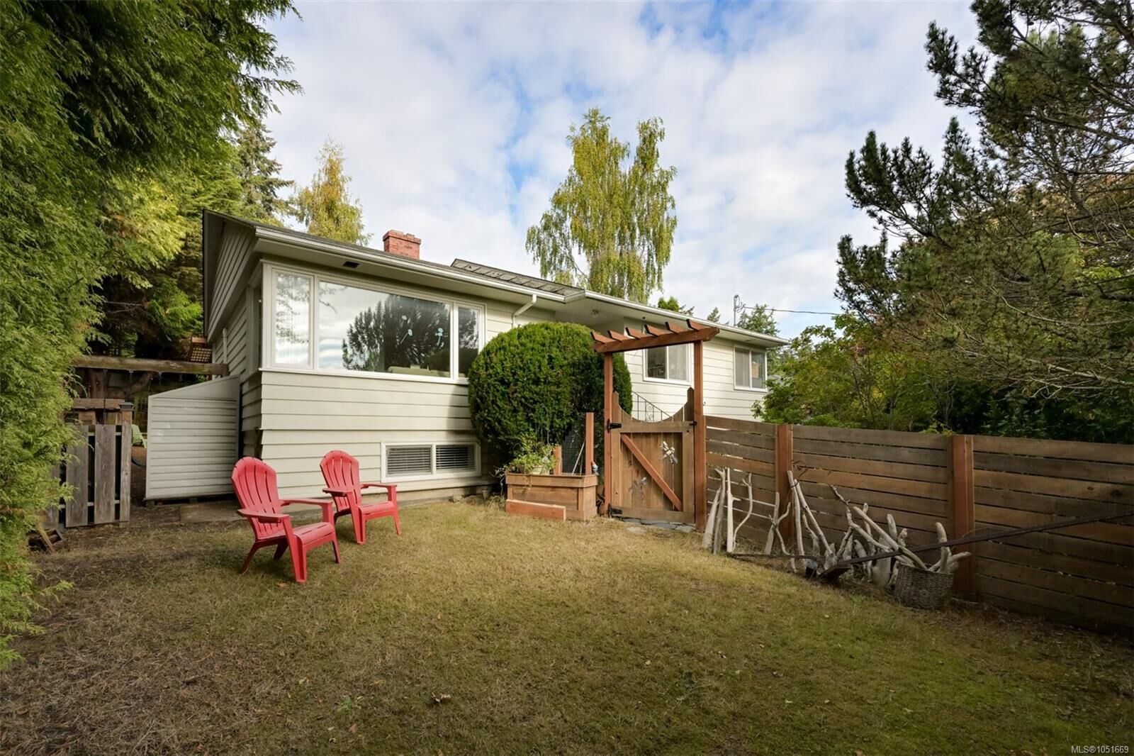 Property Photo:  3832 Pitcombe Pl  BC V8N 4B9 