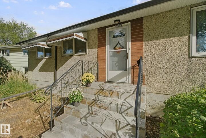 Property Photo:  11639 134 Street NW  AB T5M 1J3 