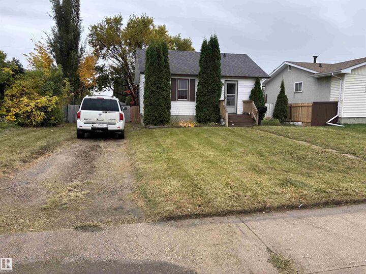Property Photo:  7623 130 Avenue NW  AB T5C 1Y3 
