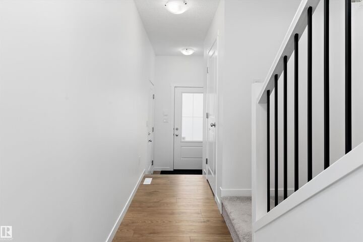 Property Photo:  13119 209 Street NW 8  AB T5S 0R4 