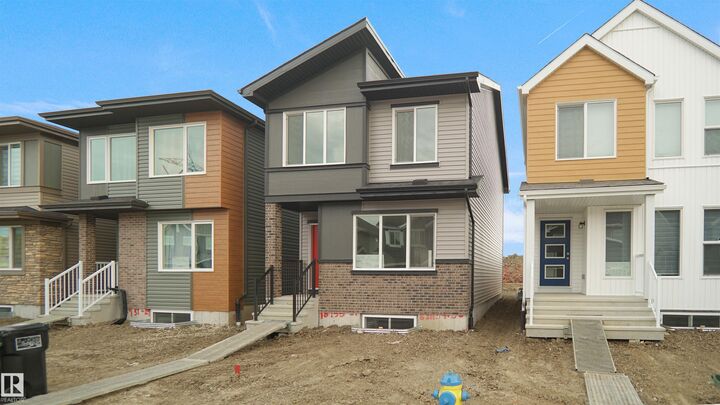 Property Photo:  20827 16 Avenue NW  AB T5Z 0T4 