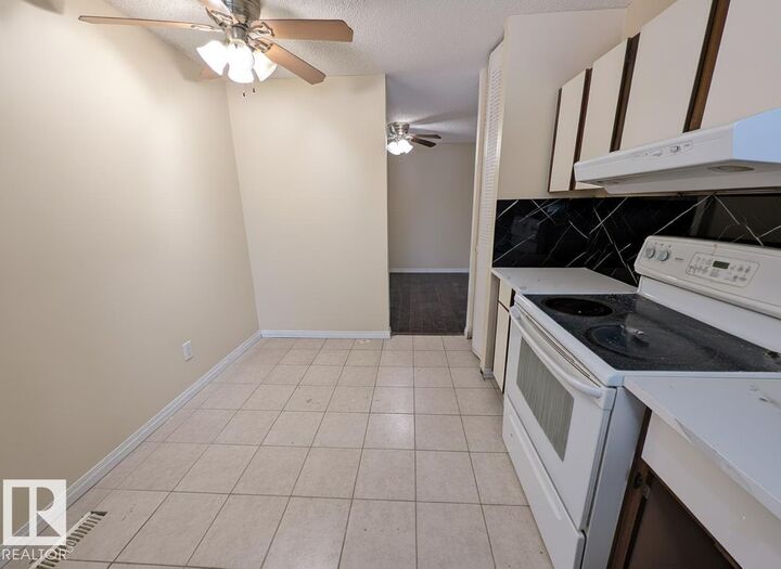 Property Photo:  46 McLeod Place NW  AB T5A 3A8 