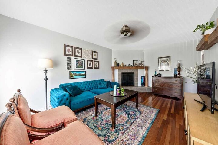 Property Photo:  218A Allan Crescent SE  AB T2J 0T4 