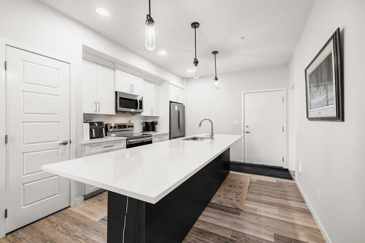 Property Photo:  300 Harvest Hills Place NE 112  AB T3K 2P4 